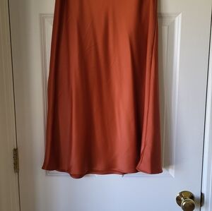 Long, pull on, skirt, 97%polyester, 3%spandex.  Machine washable